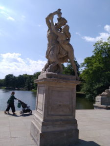 warsaw lazienki park statue of nymph catching grapes from satyrs hand