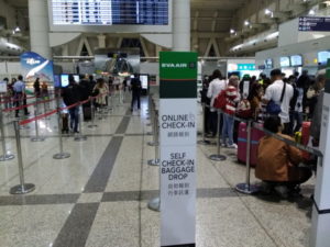 kaohsiung international airport self check-in baggage drop