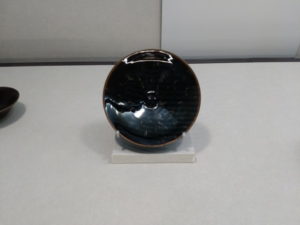 national palace museum bowl with partridge style striations on a black ground