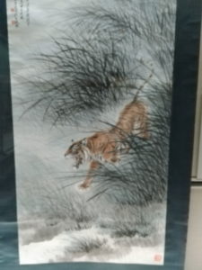 national palace museum large tiger by a grassy marsh