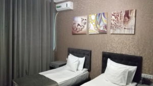 the time hotel room bed